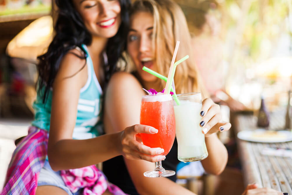 Photo of two women holding Florida Cocktails