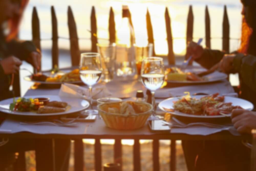 A group of 4 people enjoy Madeira Beach Seafood restaurants.