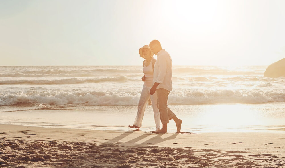 Best Madeira Beach Vacation Ideas for Couples: A couple walking on the beach